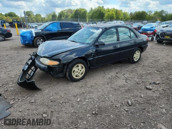 ✅ 1998 Ford Escort LX • VIN: 1FAFP10P0WW232599 • Lot: 80157755. Listed on Copart with 104,653 mi. Free auction sales archive from the USA and detailed vehicle history report at DreamBid. Image 1.
