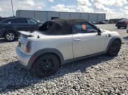 ✅ 2014 MINI Roadster • VIN: WMWSY1C50ET719556 • Lot: 65177525. Listed on Copart with 64,689 mi. Free auction sales archive from the USA and detailed vehicle history report at DreamBid. Image 3.