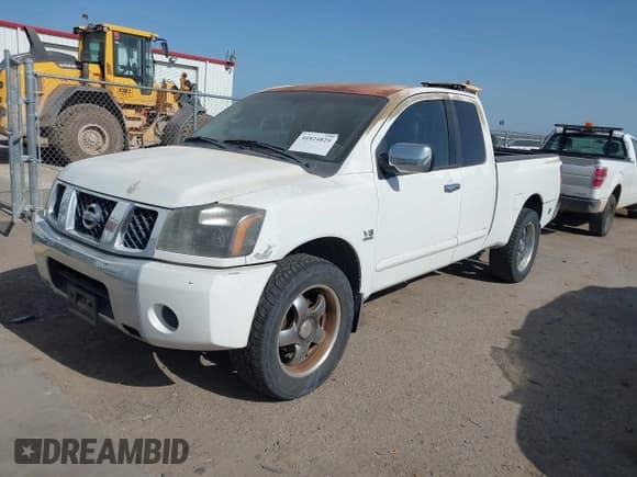 ✅ 2004 Nissan Titan XE • VIN: 1N6AA06A24N512320 • Lot: 41824825. Listed on IAAI with 153,225 mi. Free auction sales archive from the USA and detailed vehicle history report at DreamBid. Image 2.
