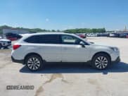 ✅ 2018 Subaru Outback Touring • VIN: 4S4BSATC5J3336205 • Lot: 42201530. Listed on IAAI with 103,362 mi. Free auction sales archive from the USA and detailed vehicle history report at DreamBid. Image 13.