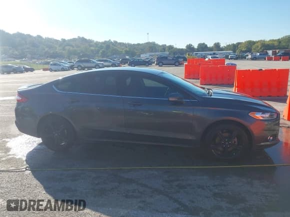 ✅ 2016 Ford Fusion SE • VIN: 3FA6P0H90GR214429 • Лот: 43574525. Опубликован ранее на IAAI с пробегом 86 637 миль. Бесплатный доступ к архиву аукционных продаж из США и подробный отчёт об истории автомобиля на DreamBid. Изображение 13.