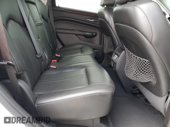 ✅ 2013 Cadillac SRX Performance Collection • VIN: 3GYFNHE36DS521908 • Lot: 65402415. Listed on Copart with 124,799 mi. Free auction sales archive from the USA and detailed vehicle history report at DreamBid. Image 11.