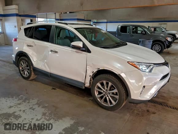 ✅ 2016 Toyota RAV4 Limited • VIN: 2T3DFREV1GW523882 • Lot: 94569615. Listed on Copart with 152,424 mi. Free auction sales archive from the USA and detailed vehicle history report at DreamBid. Image 4.