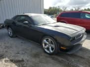 ✅ 2013 Dodge Challenger SXT • VIN: 2C3CDYAG2DH579252 • Lot: 77498104. Wystawiony na Copart z przebiegiem 99 926 mil. Bezpłatny archiwum sprzedaży aukcyjnych z USA i szczegółowy raport historii pojazdu na DreamBid. Zdjęcie 4.