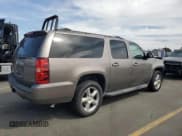 ✅ 2011 Chevrolet Suburban LS • VIN: 1GNSKHE34BR265840 • Lot: 81604565. Listed on Copart with 123,754 mi. Free auction sales archive from the USA and detailed vehicle history report at DreamBid. Image 3.
