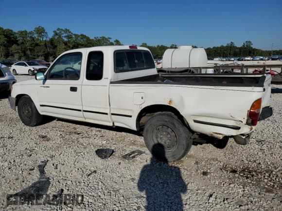 ✅ 1999 Toyota Tacoma • VIN: 4TAVL52N5XZ561492 • Lot: 86814935. Listed on Copart with 279,608 mi. Free auction sales archive from the USA and detailed vehicle history report at DreamBid. Image 2.