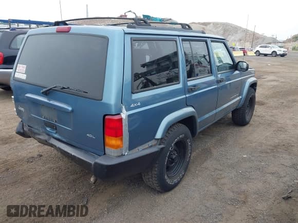 ✅ 1999 Jeep Cherokee Sport • VIN: 1J4FF68S7XL513640 • Lot: 42913382. Listed on IAAI with 207,133 mi. Free auction sales archive from the USA and detailed vehicle history report at DreamBid. Image 4.