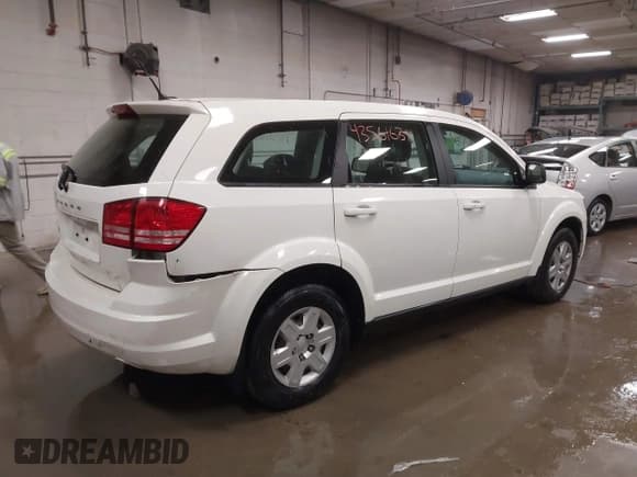 ✅ 2012 Dodge Journey American Value • VIN: 3C4PDCAB5CT203770 • Lot: 43561631. Listed on IAAI with 69,936 mi. Free auction sales archive from the USA and detailed vehicle history report at DreamBid. Image 4.