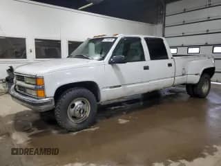 1997 Chevrolet Silverado 3500 with VIN 1GCHC33J5VF002668, listed as a Copart auction lot 87199575 with 156,834 mi miles and Clean title. Bid and sale history available at DreamBid. Image 1.