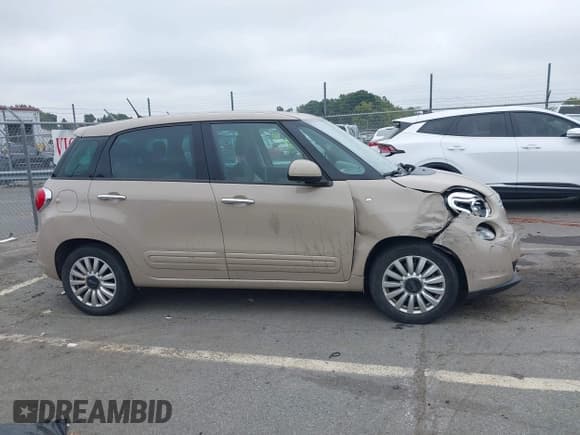 ✅ 2014 FIAT 500L Easy • VIN: ZFBCFABH1EZ012569 • Лот: 43310355. Опубликован ранее на IAAI с пробегом 128 566 миль. Бесплатный доступ к архиву аукционных продаж из США и подробный отчёт об истории автомобиля на DreamBid. Изображение 13.