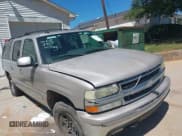 ✅ 2004 Chevrolet Suburban LT • VIN: 1GNFK16Z24J154314 • Lot: 42462404. Listed on IAAI with 275,938 mi. Free auction sales archive from the USA and detailed vehicle history report at DreamBid. Image 1.