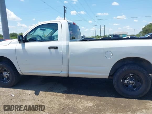 ✅ 2014 Ram 1500 Tradesman • VIN: 3C6JR7DT5EG285098 • Lot: 43025577. Listed on IAAI with 224,814 mi. Free auction sales archive from the USA and detailed vehicle history report at DreamBid. Image 14.