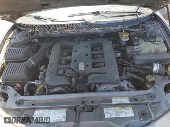 ✅ 2004 Chrysler 300M M • VIN: 2C3AE76K74H680539 • Lot: 59333845. Listed on Copart with 101,090 mi. Free auction sales archive from the USA and detailed vehicle history report at DreamBid. Image 11.