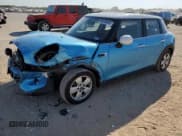 ✅ 2018 MINI Hardtop 4 Door Cooper • VIN: WMWXU1C51J2F79229 • Lot: 86406645. Listed on Copart with 36,986 mi. Free auction sales archive from the USA and detailed vehicle history report at DreamBid. Image 1.