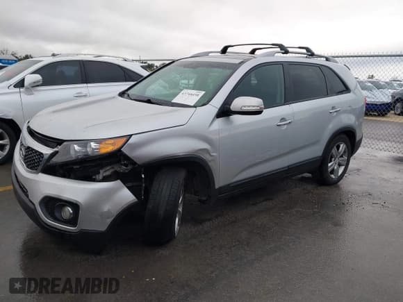 ✅ 2012 Kia Sorento EX • VIN: 5XYKU4A20CG209015 • Lot: 43748458. Listed on IAAI with 144,112 mi. Free auction sales archive from the USA and detailed vehicle history report at DreamBid. Image 2.