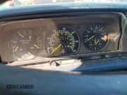 ✅ 1989 Mercedes-Benz 190 • VIN: WDBDA29D0KF609460 • Lot: 76746744. Wystawiony na Copart z przebiegiem 57 439 mil. Bezpłatny archiwum sprzedaży aukcyjnych z USA i szczegółowy raport historii pojazdu na DreamBid. Zdjęcie 9.