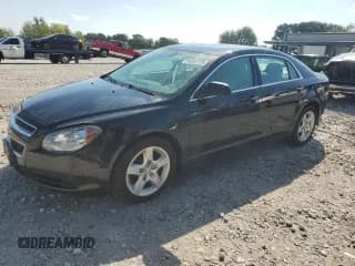 ✅ 2012 Chevrolet Malibu 1LS • VIN: 1G1ZB5E09CF289039 • Lot: 84261725. Listed on Copart with 150,020 mi. Free auction sales archive from the USA and detailed vehicle history report at DreamBid. Image 1.