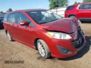 ✅ 2013 Mazda 5 Touring • VIN: JM1CW2CL5D0150270 • Lot: 42696073. Listed on IAAI with 98,715 mi. Free auction sales archive from the USA and detailed vehicle history report at DreamBid. Image 1.