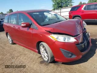 ✅ 2013 Mazda 5 Touring • VIN: JM1CW2CL5D0150270 • Lot: 42696073. Listed on IAAI with 98,715 mi. Free auction sales archive from the USA and detailed vehicle history report at DreamBid. Image 1.