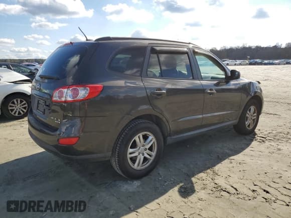 ✅ 2011 Hyundai Santa Fe GLS • VIN: 5XYZGDAG0BG012202 • Lot: 76364974. Listed on Copart with 108,287 mi. Free auction sales archive from the USA and detailed vehicle history report at DreamBid. Image 3.