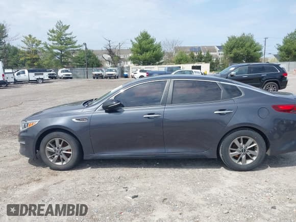 ✅ 2017 Kia Optima LX • VIN: 5XXGT4L12HG173515 • Лот: 42040458. Опубликован ранее на IAAI с пробегом 103 595 миль. Бесплатный доступ к архиву аукционных продаж из США и подробный отчёт об истории автомобиля на DreamBid. Изображение 13.