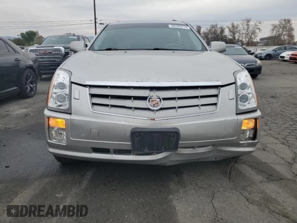 ✅ 2007 Cadillac SRX • VIN: 1GYEE63A270153014 • Лот: 86528714. Опубликован ранее на Copart с пробегом 79 280 миль. Бесплатный доступ к архиву аукционных продаж из США и подробный отчёт об истории автомобиля на DreamBid. Изображение 5.