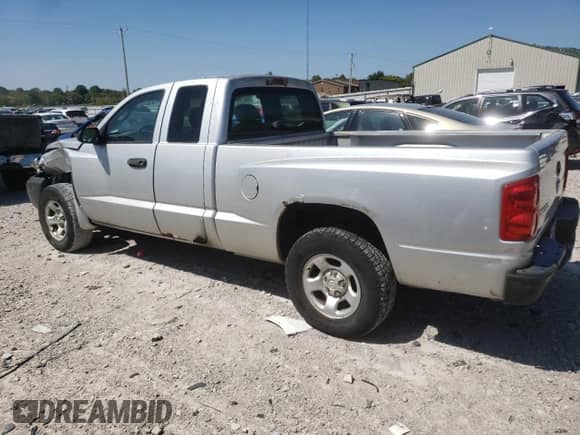 2005 Dodge Dakota ST с VIN 1D7HE22K45S153545, выставлен на аукционе Copart как лот 70364364 с пробегом 169 212 миль миль и Списание • Salvage title. История ставок и продаж доступна на DreamBid. Изображение 2.