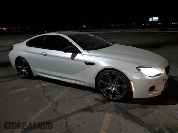 ✅ 2017 BMW M6 • VIN: WBS6J9C56HD934812 • Лот: 44018915. Опубликован ранее на Copart с пробегом 84 409 миль. Бесплатный доступ к архиву аукционных продаж из США и подробный отчёт об истории автомобиля на DreamBid. Изображение 4.