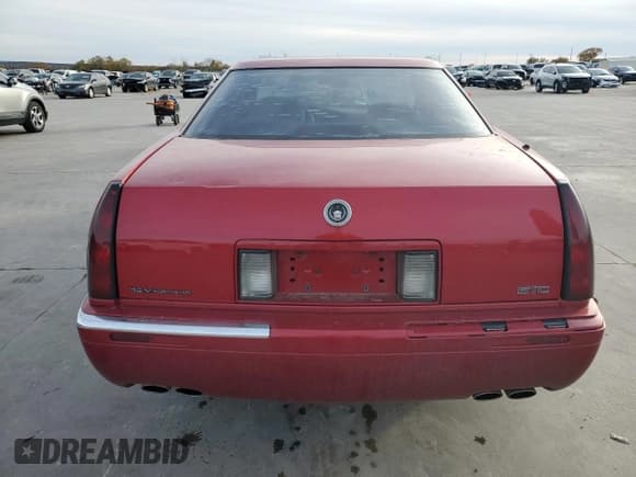 ✅ 1998 Cadillac Eldorado Touring • VIN: 1G6ET1291WU601906 • Лот: 84911624. Опубликован ранее на Copart с пробегом 84 489 миль. Бесплатный доступ к архиву аукционных продаж из США и подробный отчёт об истории автомобиля на DreamBid. Изображение 6.