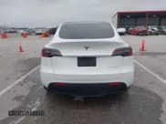 ✅ 2023 Tesla Model Y Long Range • VIN: 7SAYGDEE9PA069095 • Lot: 41986700. Listed on IAAI with 19,484 mi. Free auction sales archive from the USA and detailed vehicle history report at DreamBid. Image 17.
