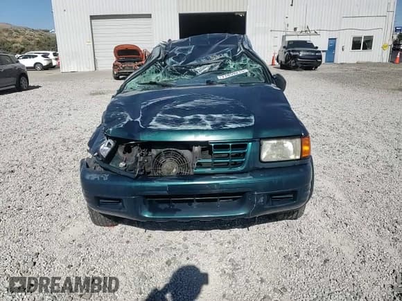 ✅ 1999 Isuzu Rodeo S • VIN: 4S2CM58W9X4352430 • Lot: 71859215. Wystawiony na Copart z przebiegiem 110 654 mil. Bezpłatny archiwum sprzedaży aukcyjnych z USA i szczegółowy raport historii pojazdu na DreamBid. Zdjęcie 13.