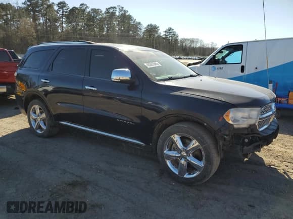 ✅ 2013 Dodge Durango Citadel • VIN: 1C4SDHET0DC662129 • Lot: 48387885. Listed on Copart with 125,454 mi. Free auction sales archive from the USA and detailed vehicle history report at DreamBid. Image 4.