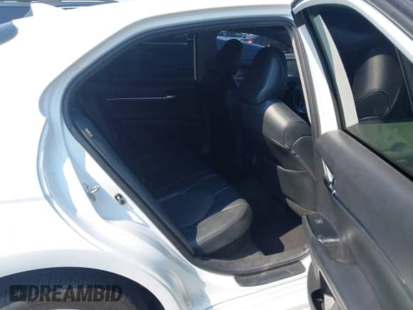 2020 Toyota Camry Hybrid SE z VIN 4T1G31AK0LU541702, wystawiony jako IAAI lot #42918554 z przebiegiem 118 679 mil mil oraz . Historia ofert i sprzedaży dostępna na DreamBid. Obrazek 8.