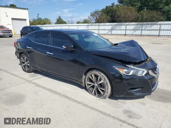 ✅ 2017 Nissan Maxima Platinum • VIN: 1N4AA6AP4HC444174 • Lot: 82112205. Listed on Copart with 100,785 mi. Free auction sales archive from the USA and detailed vehicle history report at DreamBid. Image 4.
