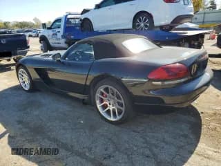 ✅ 2004 Dodge Viper SRT-10 • VIN: 1B3JZ65Z44V101704 • Lot: 71448694. Listed on Copart with 62,624 mi. Free auction sales archive from the USA and detailed vehicle history report at DreamBid. Image 2.