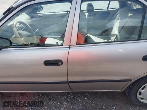 ✅ 1999 Toyota Corolla VE • VIN: 1NXBR12E6XZ251505 • Lot: 42480435. Listed on IAAI with 178,568 mi. Free auction sales archive from the USA and detailed vehicle history report at DreamBid. Image 14.