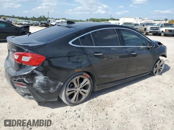 ✅ 2017 Chevrolet Cruze Premier • VIN: 1G1BF5SM9H7125448 • Lot: 57955713. Listed on Copart with 90,562 mi. Free auction sales archive from the USA and detailed vehicle history report at DreamBid. Image 3.