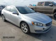 ✅ 2015 Volvo S60 T5 Drive-E Premier • VIN: YV140MFK4F1362802 • Lot: 43538907. Listed on IAAI with 74,110 mi. Free auction sales archive from the USA and detailed vehicle history report at DreamBid. Image 1.