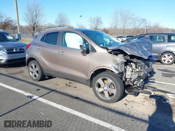 ✅ 2014 Buick Encore • VIN: KL4CJESB5EB600301 • Lot: 41066147. Wystawiony na IAAI z przebiegiem 60 190 mil. Bezpłatny archiwum sprzedaży aukcyjnych z USA i szczegółowy raport historii pojazdu na DreamBid. Zdjęcie 1.