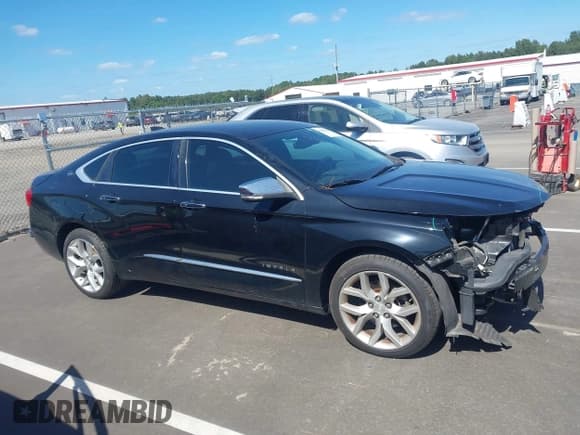 ✅ 2015 Chevrolet Impala LTZ • VIN: 2G1155SL4F9221585 • Lot: 43328339. Listed on IAAI with 200,526 mi. Free auction sales archive from the USA and detailed vehicle history report at DreamBid. Image 14.