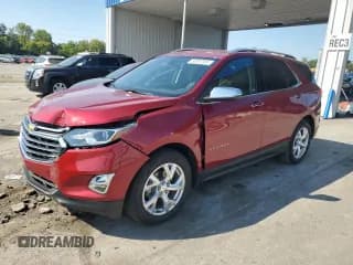 ✅ 2019 Chevrolet Equinox Premier • VIN: 3GNAXNEV7KS671735 • Лот: 80397005. Опубликован ранее на Copart с пробегом 23 153 миль. Бесплатный доступ к архиву аукционных продаж из США и подробный отчёт об истории автомобиля на DreamBid. Изображение 1.