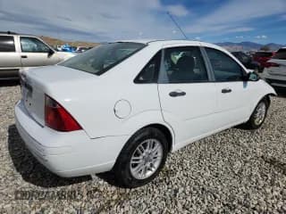✅ 2007 Ford Focus S • VIN: 1FAHP34N07W194709 • Lot: 86145735. Wystawiony na Copart z przebiegiem 169 530 mil. Bezpłatny archiwum sprzedaży aukcyjnych z USA i szczegółowy raport historii pojazdu na DreamBid. Zdjęcie 3.
