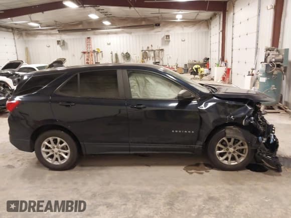 ✅ 2021 Chevrolet Equinox LS • VIN: 3GNAX5EV2MS142857 • Lot: 43568257. Listed on IAAI with 103,905 mi. Free auction sales archive from the USA and detailed vehicle history report at DreamBid. Image 13.