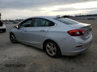 ✅ 2018 Chevrolet Cruze LT • VIN: 1G1BE5SM9J7166414 • Lot: 40713353. Wystawiony na Copart z przebiegiem 107 248 mil. Bezpłatny archiwum sprzedaży aukcyjnych z USA i szczegółowy raport historii pojazdu na DreamBid. Zdjęcie 2.