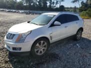 ✅ 2014 Cadillac SRX Performance Collection • VIN: 3GYFNFE33ES624242 • Lot: 70950585. Wystawiony na Copart z przebiegiem 133 393 mil. Bezpłatny archiwum sprzedaży aukcyjnych z USA i szczegółowy raport historii pojazdu na DreamBid. Zdjęcie 1.