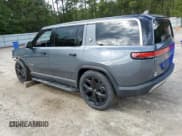 ✅ 2024 Rivian R1S Adventure • VIN: 7PDSGCBA8RN037656 • Lot: 84908465. Listed on Copart with 10,322 mi. Free auction sales archive from the USA and detailed vehicle history report at DreamBid. Image 2.