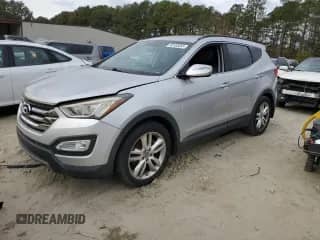 2013 Hyundai Santa Fe Sport z VIN 5XYZU3LA7DG075277, wystawiony jako Copart lot #90100465 z przebiegiem 166 672 mil mil oraz Czysty tytuł • Clean title. Historia ofert i sprzedaży dostępna na DreamBid. Obrazek 1.