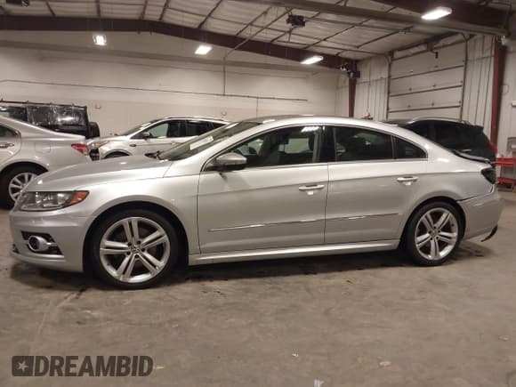 ✅ 2013 Volkswagen CC R-Line • VIN: WVWBN7AN1DE541631 • Lot: 43662152. Listed on IAAI with 127,075 mi. Free auction sales archive from the USA and detailed vehicle history report at DreamBid. Image 14.