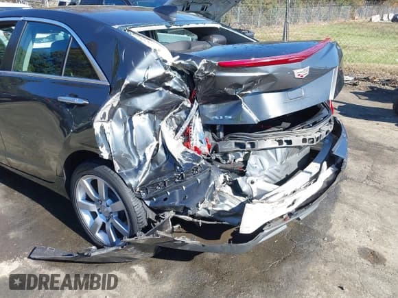 ✅ 2015 Cadillac ATS Standard RWD • VIN: 1G6AA5RA9F0138139 • Лот: 43624647. Опубликован ранее на IAAI с пробегом 99 817 миль. Бесплатный доступ к архиву аукционных продаж из США и подробный отчёт об истории автомобиля на DreamBid. Изображение 6.