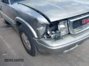 ✅ 2000 GMC Jimmy SLE Convenience • VIN: 1GKDT13WXY2376580 • Lot: 41953599. Wystawiony na IAAI z przebiegiem 296 623 mil. Bezpłatny archiwum sprzedaży aukcyjnych z USA i szczegółowy raport historii pojazdu na DreamBid. Zdjęcie 6.